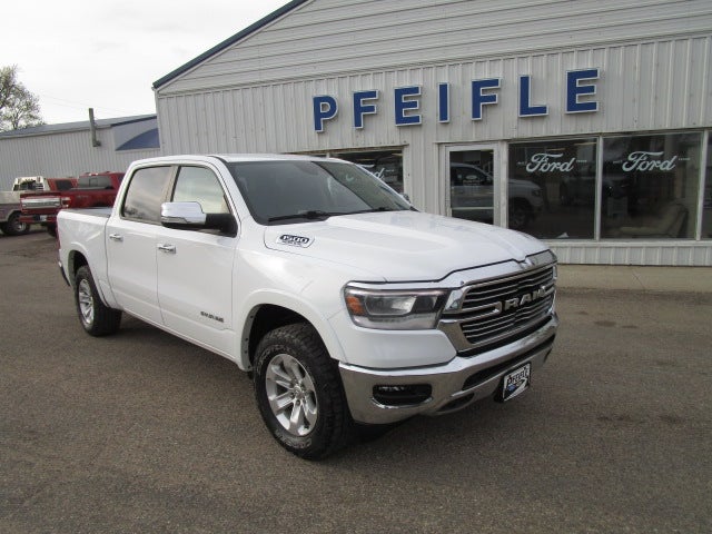 2021 RAM 1500 Laramie in White — front three-quarter view