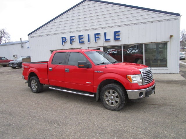 2012 Ford F-150 Lariat in Vermillion Red — front three-quarter view