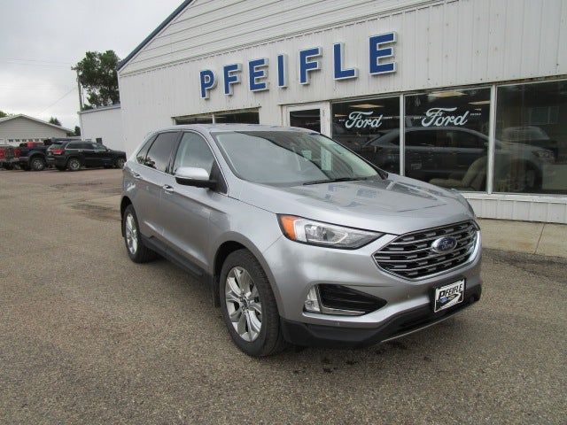 2021 Ford Edge Titanium in Iconic Silver Metallic — front three-quarter view