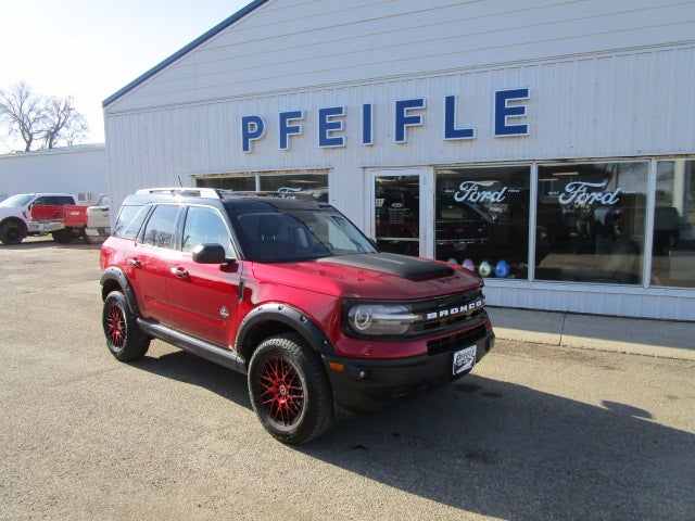 2021 Ford Bronco Sport Outer Banks in Rapid Red Metallic Tinted Clearcoat — front three-quarter view
